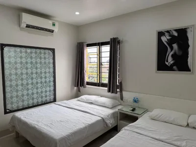 Vierbettzimmer — MeKong Hotel